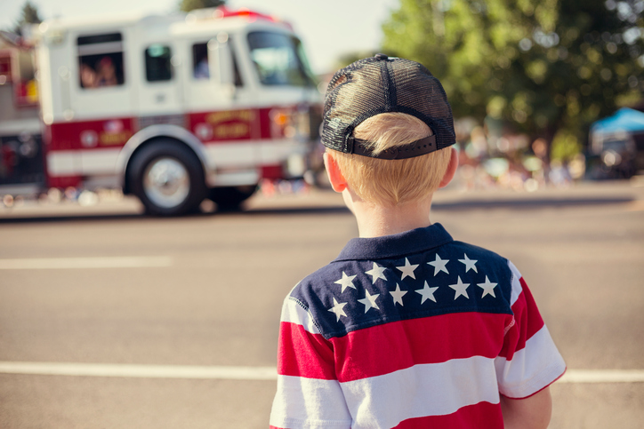 Boy watching an Independence Day Parade